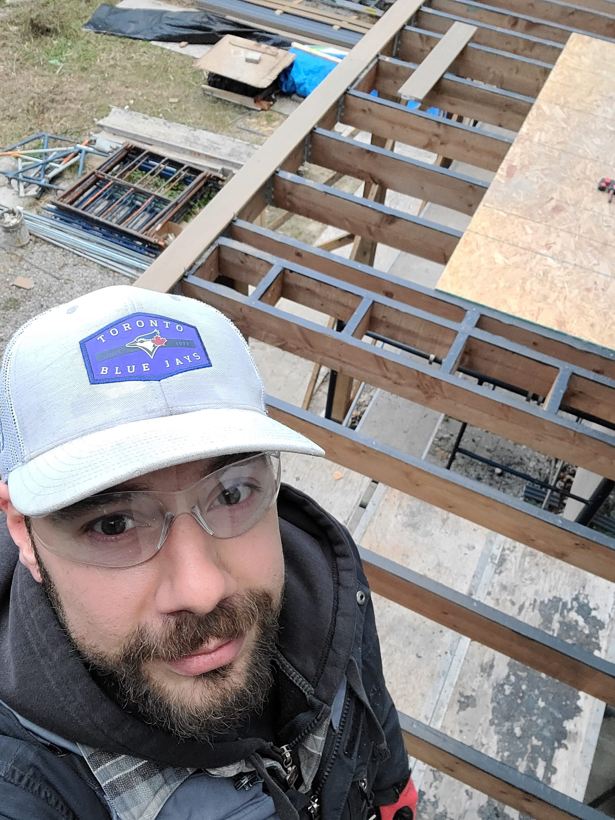 Phil, founder of Blue Tile & Marble, on a Toronto framing job site
